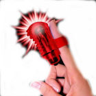 The FingO Glow - Finger-Fitting Light-Up Mini Massager - Red