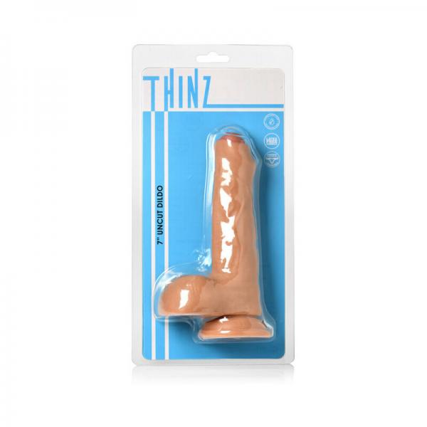 Thinz Uncut 6.5 In. Dildo With Balls Light Sex Toy Product